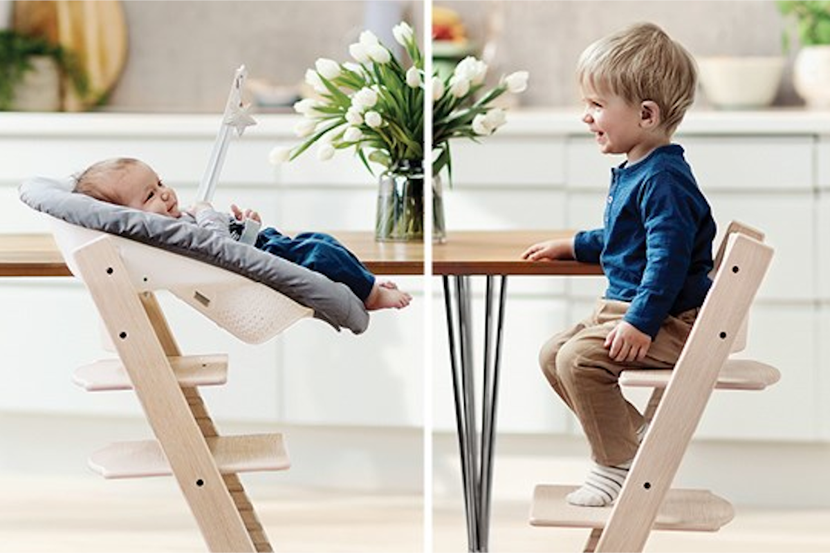 trona evolutiva Stokke en uso con recién nacido y niño